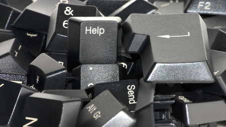 Help key mixed in a lot of keys from a black keyboard. 