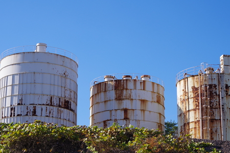 Under the blue sky of cement tankの写真素材