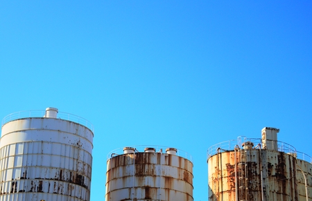 Under the blue sky of cement tankの写真素材