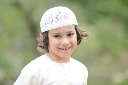 Portrait of Arab little kid outdoorの写真素材