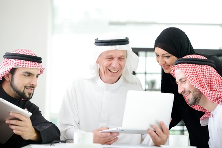 Business arabic people meeting indoor with electronic tabletの写真素材