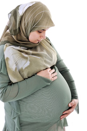 Pregnant  muslim woman with happy expression の写真素材