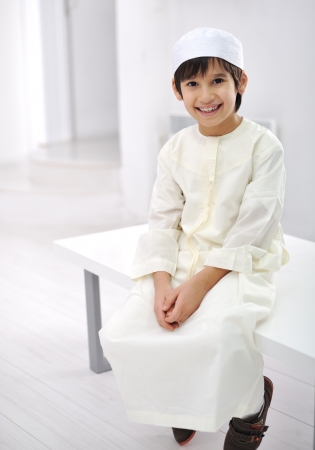 Little Arabic kid indoorの写真素材