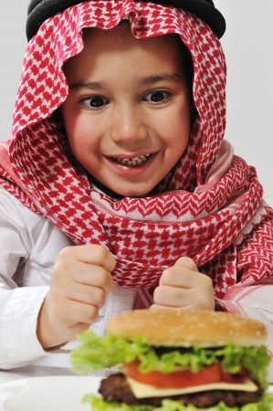 Little boy with hamburgerの写真素材