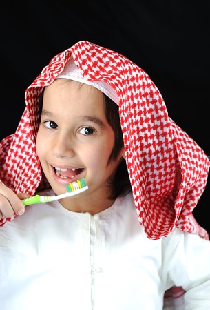 Arabic Muslim kid brushing teethの写真素材