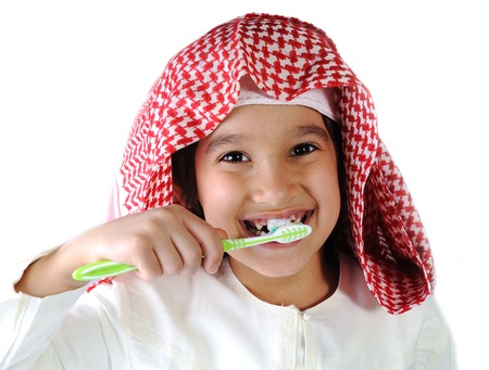 Arabic Muslim kid brushing teethの写真素材