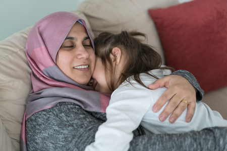 Muslim Mother and Son Having Funの写真素材