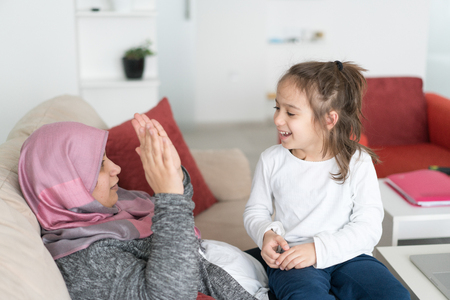 Muslim Mother and Son Having Funの写真素材