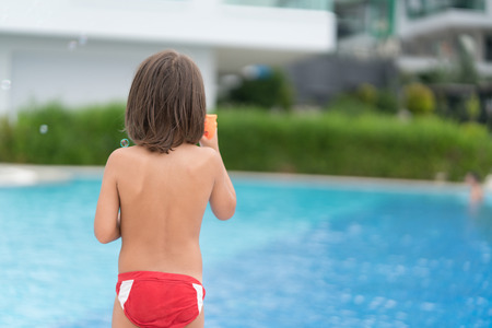 Kid on pool