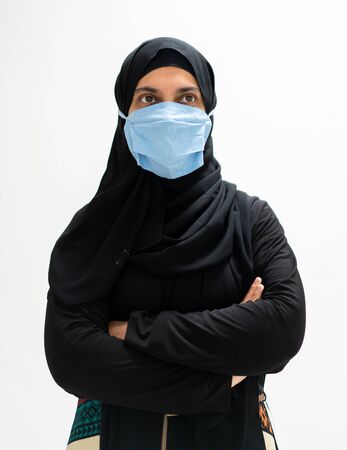 Muslim woman wearing mask against virusの写真素材