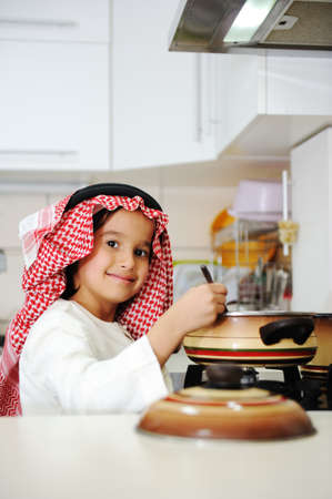 Little kid boy is cooking , high quality photosの写真素材