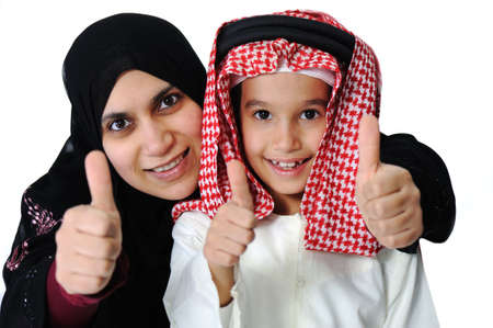 Arabic Muslim mother and son with thumb upの写真素材