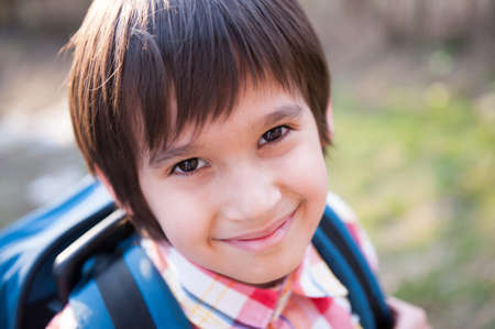 potrait of a cute boy in park. High quality photoの写真素材