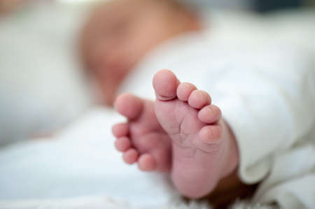 Newborn baby in first week of his lifeの写真素材