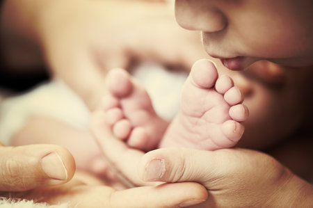 Newborn baby with his older brother, high quality photo