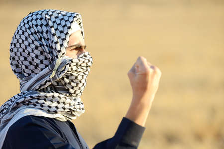 Arabic man on the meadow , high quality photoの写真素材