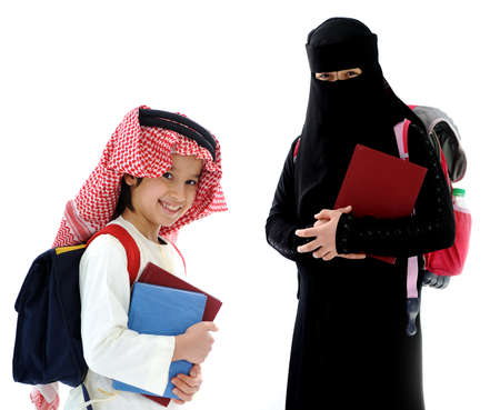 Middle eastern children with a backpack and the bookの写真素材