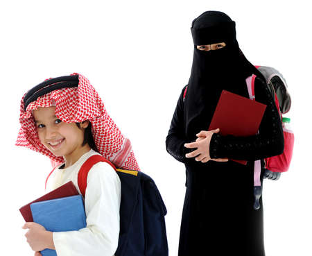 Arabic boy and girl with a backpack and the bookの写真素材