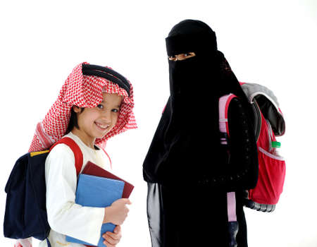 Arabic little boy and girl going to schoolの写真素材