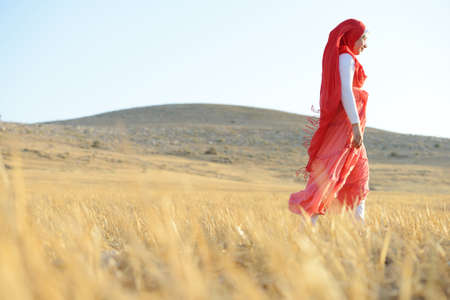 Happy girl on meadowの写真素材