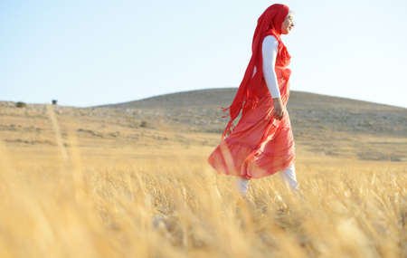 Happy girl on meadowの写真素材