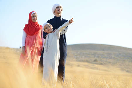 Happy family in natureの写真素材