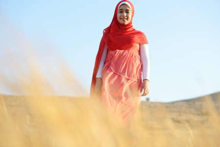 Happy girl on meadowの写真素材