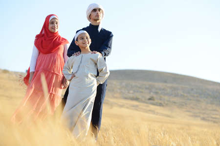 Happy family in natureの写真素材