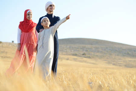 Happy family in natureの写真素材