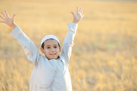 Arabic happy child in natureの写真素材