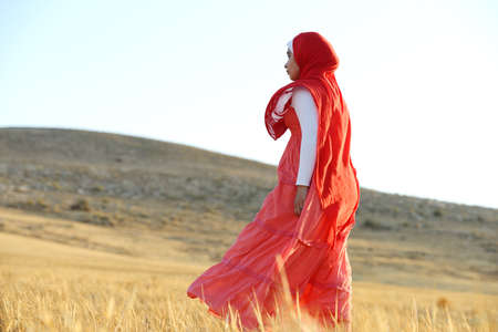 Happy girl on meadowの写真素材