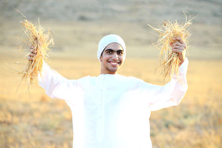 Kids on wheat fieldの写真素材
