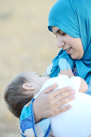 Mom with baby in natureの写真素材