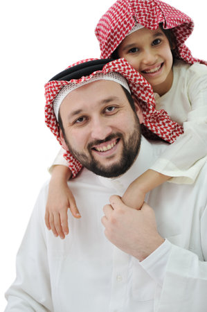Arabic family, father piggybacking sonの写真素材