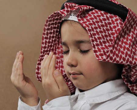 Arabic Kid praying Doaの写真素材
