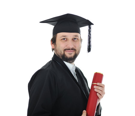 excited graduate student in gownの写真素材