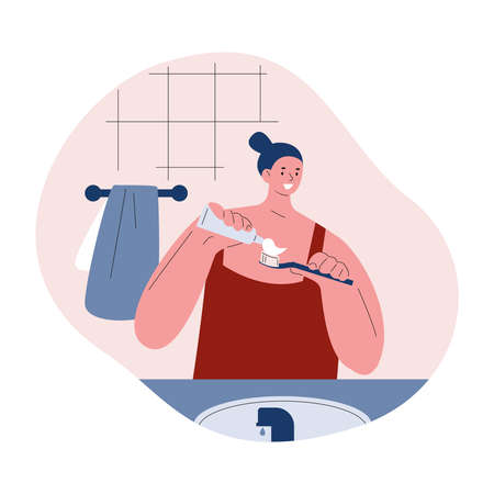 The woman is brushing her teeth in the bathroom. Vector illustration in flat style.のイラスト素材