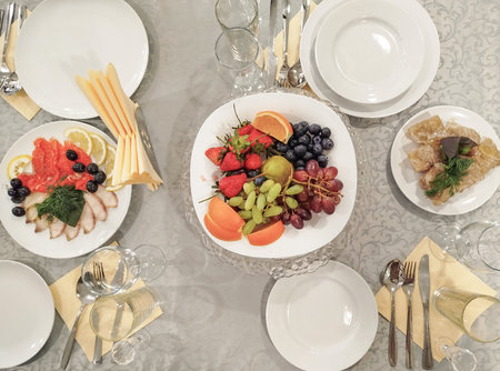 Table set for a festive mealの写真素材