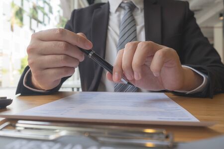 Apply for a job with a resume and search for qualified employees to screen jobs on a computer desk.の写真素材