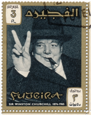 FUJERIA - CIRCA 1966: A stamp printed in Fujeira shows image of sir winston churchil, 1874-1965, circa 1966 のeditorial素材
