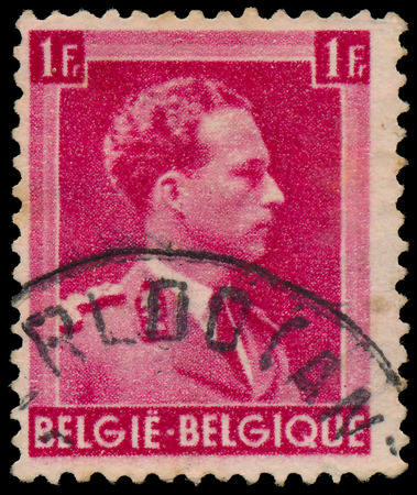 BELGIUM - CIRCA 1941: A stamp printed in Belgium, shows portrait Leopold III (1901-1983) King of the Belgians from 1934 until 1951, circa 1941 のeditorial素材