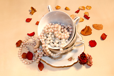 coffee cups with pearls and rosesの写真素材