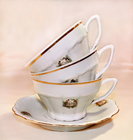 three coffee cups on pink backgroundの写真素材