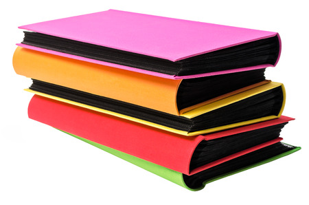 The pile of colored photo albums on wite isolated backroundの写真素材