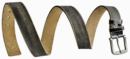 Black leather men's belt in form of spiral hung in the airの写真素材