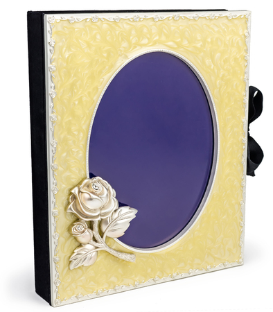 Beautiful photo album with frame on white backround. On album there is a place for your photos or textの写真素材