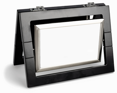 Black photo frame rotated in a plane isolated on white backgroundの写真素材