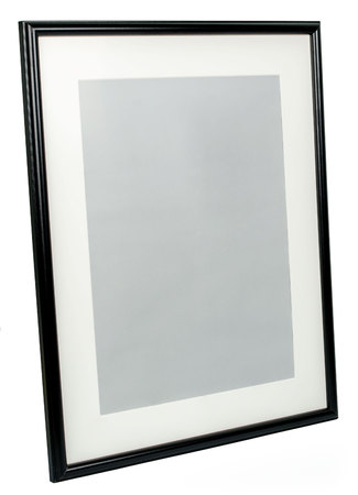 Black photo frame rotated in a plane isolated on white backgroundの写真素材