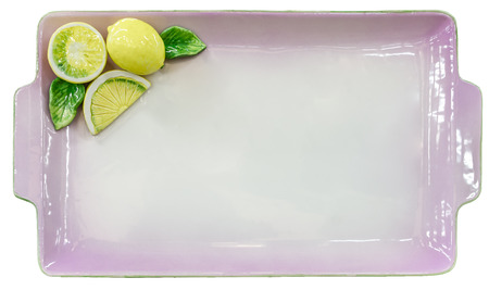 Empty lilac tray with lemons on white isolated backgroundの写真素材