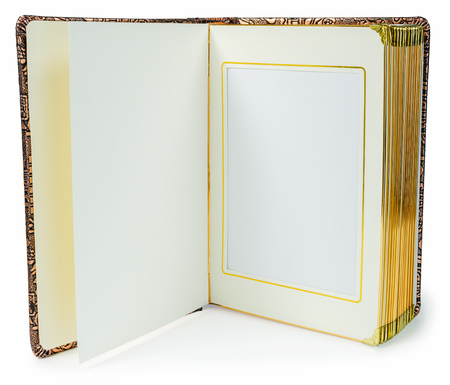 Opened book with blank pages and decorative gold  frame for text on a white backgroundの写真素材